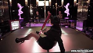 Stylish strip club performance with dancing, teasing, and baseball bat by Nacho Vidal