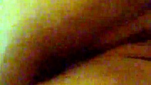 Mzslippery teases with her shaved pussy in front of the mirror