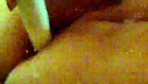 Mzslippery teases with her shaved pussy in front of the mirror