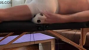 groin stretch in tight spandex shorts with mini soccer ball slowed down