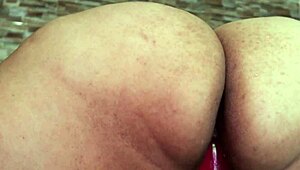 a bbw latina milf squirts hard in her bedroom, showin off her big natural tits and tight pussy