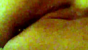 Mzslippery teases with her shaved pussy in front of the mirror