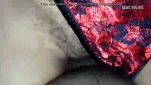 Ebony girl in red panties gets fucked with condom, contrasting passion and caution.