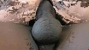 the mature maid handles a huge black cock in stockings