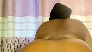 Whore masturbates with dildo