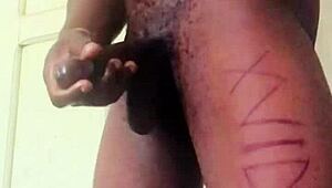 The guy is jerking his big monster cock