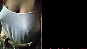 A beautiful curvy woman with big natural tits shows her boobs in public while walking outdoors