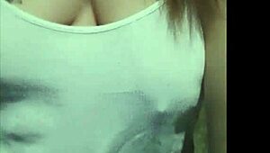 A beautiful curvy woman with big natural tits shows her boobs in public while walking outdoors