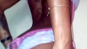 Lola performs a seductive dance, ripping her clothes and stripping down.