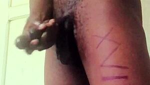 The guy is jerking his big monster cock