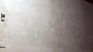 Hidden cam captures Colombian university babe undressing, her perfect body and big tits on display.