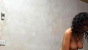 Hidden cam captures Colombian university babe undressing, her perfect body and big tits on display.