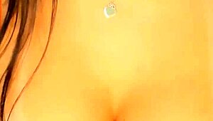 hot brunette teases tits and plugs ass