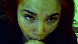 sexy redhead giving a blowjob