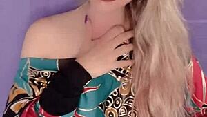 Blonde Woman With Long Hair And Nails In Fetish Scene