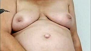 Hey, watch this dirty housewife wanking at home - feels so good!