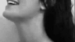 Sexy brunette enjoys a relaxing shower bath