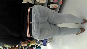 i am filming this chubby girl at the supermarket, she is walking the aisles and picking groceries