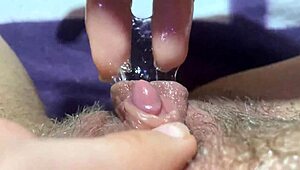 Close-up view of huge clit during intense moment
