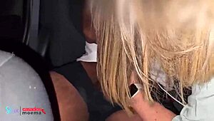 The husband watches his wife mingle at the group gathering in the car