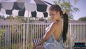 Ebony Kira Noir is a black milf with big tits and ass exposed by Playboy