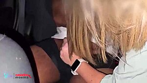 The husband watches his wife mingle at the group gathering in the car