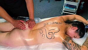 male masseur gives massage to tattoo girl but she wanted more and he gave it