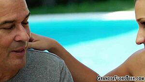 Hey grandpa, watch this brunette teen suck my cock outdoors.