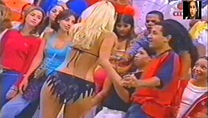 i watch lady lu doin her super positve striptease, rippin her clothes off on brazilian tv