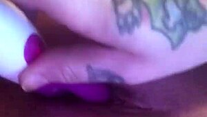 She casually plays with her soft, wet pussy using toys, reaching orgasm.