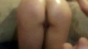 Watch this petite teen oil her tight ass and squirt