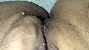 Gretala displays her big pussy and pussy lips in sensual oily scenes