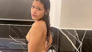 the skinny 18-year-old fucks herself in the bathtub very horny