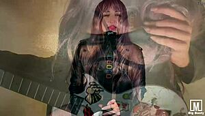 Rocker passionately caresses her wet pussy with vibrator and butt plug