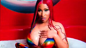 Nicki Minaj indulges in masturbation with her sexy big tits and nude redhead body.