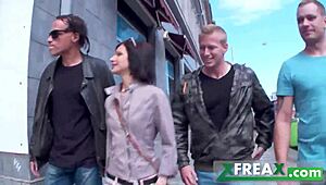 Ukrainian girl Lina Arian gets warmed up in a park and taken home by three guys for a gang bang