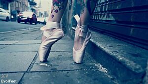 Ballerina struts down the street in ballet shoes, barefoot and dancing. 💃