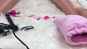 I massaged her oiled body, then fucked her pussy and asshole hard with a glass dildo. She loved it and went home to her husband swollen