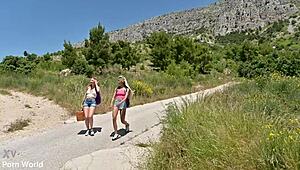 Rebecca Volpetti and Veronica Leal embark on a luscious lesbian vacation, sharing a strap-on in outdoor adventures with fingering, kissing, and anal play.