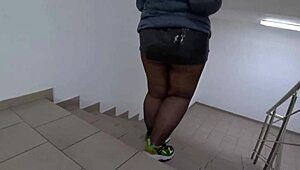 Hey, check out this public foot fetish session with fat legs in nylon pantyhose, a juicy pawg teasing on the mall stairs under her skirt