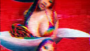 Nicki Minaj indulges in masturbation with her sexy big tits and nude redhead body.