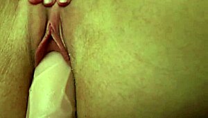 Stretching tight pussy with huge dildo in amateur scene