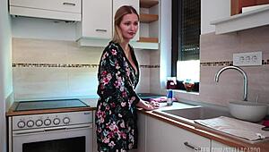 housewife dances in the kitchen