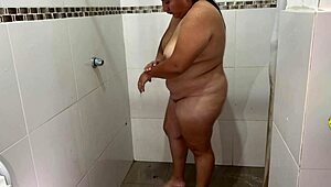 amazing i put a hidden camera while my neighbor bathes and while she bathes she touches herself very well