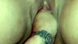 dominant hand fists deep into whore's stretched gaping hole