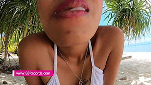 filipina cutie gives public beach blowjob and swallows cum