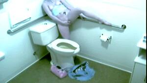 hot blonde babe caught fingering wet pussy hard in public office toilet on hidden cam