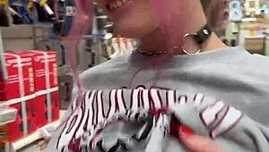 hey, check out this busty babe flashing pierced tits everywhere in the store