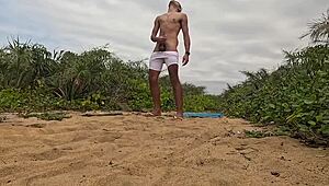 Intriguing african beach handjob ends in massive cumshot explosion