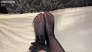 anna dons black gloves and fishnets then fingers her ass and pussy solo